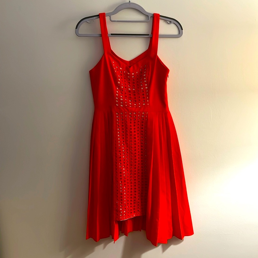 Dress with unique pleated and textured details. From Anthropologie.